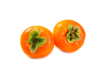 Persimmon isolated on white background. Persimmon fruit. Slice of ripe, juicy, sweet persimmon fruit. Vegan. Fruit garden. Close-up.