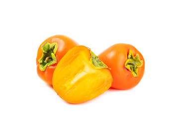 Persimmon isolated on white background. Persimmon fruit. Slice of ripe, juicy, sweet persimmon fruit. Vegan. Fruit garden. Close-up.
