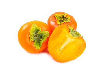 Persimmon isolated on white background. Persimmon fruit. Slice of ripe, juicy, sweet persimmon fruit. Vegan. Fruit garden. Close-up.