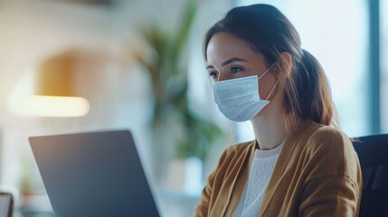 A team of diverse workers collaborating through a digital communication platform on their laptops in a conference room