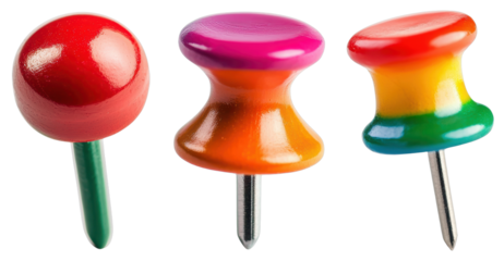 Colorful push pins on a black background