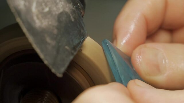 Manual engraving of crystal and jewelry on a machine, close-up