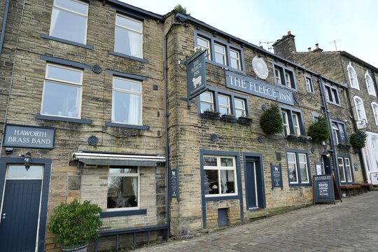 The Fleece Inn, built in the early 15th century as a longhouse by a wealthy yeoman farmer named Byrd. Haworth, Keighley, West Yorkshire, UK. November 2024. 