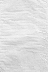 Vertical gray crumpled paper texture