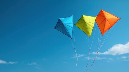 A photostock of colorful kites soaring in a bright blue sky during a vibrant festival for joyful designs. High Quality