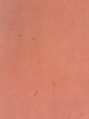 Structure of a terracotta-colored house facade