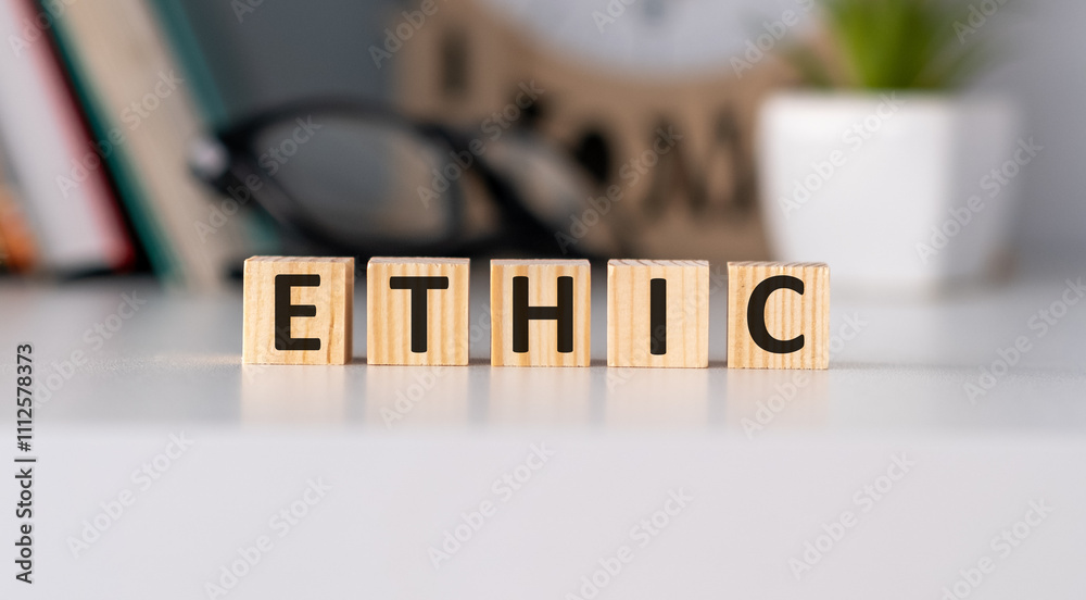 Fototapete ethic concepts with wooden text alphabet block on office background