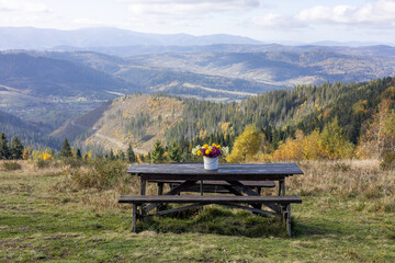 Wooden tables in the mountains