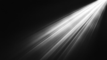 Light beam shining coming through darkness creating abstract lines black background