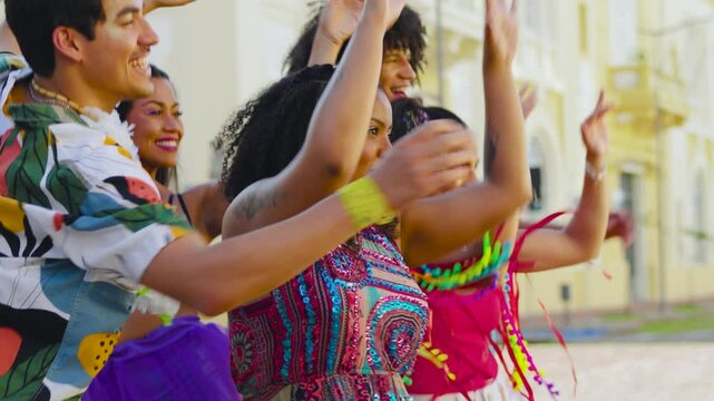 Carnival Revelers Share Dance and Smiles. Brazilian Street Fest Brings Together Vibrant Costumes and Choreography