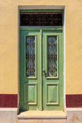 Colored door of a traditional Greek house on Symi island. Greece