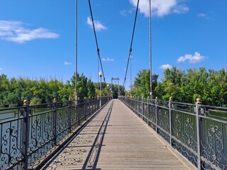 Obraz premium wooden bridge over river