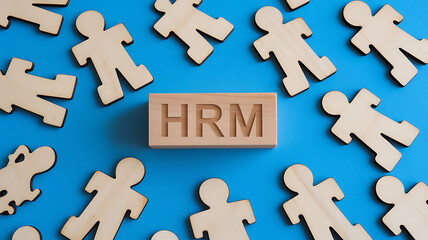 Obraz premium HRM: Human Resources Management, Employee Engagement, Recruitment, and Organizational Growth, human resources management concept. Wooden figures on the blue background, hrm copy space, hrm background