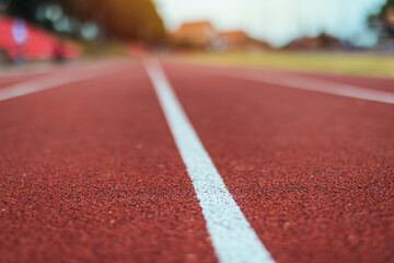 Running Track Close-Up Capturing the Red Surface and White Line