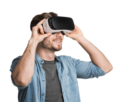 Young man using virtual reality headset isolated in transparent PNG, VR, future, gadgets, technology concept