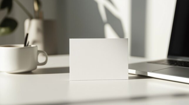 Minimalist blank business card holder on modern desk for branding and office decor