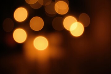 Fototapeta premium Warm soft bokeh lights creating a cozy abstract holiday atmosphere.