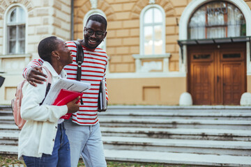 Joyful College Students Walking Together On University Campus