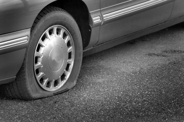 Flat Tire On Road Danger Dangerous Stranded Deflate Deflated Needing Help and Repair