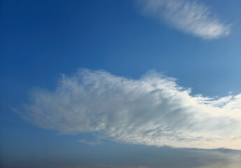 Summer evening or winter evening blue sky cloud gradient light white background. Gloomy vivid cyan. Morning sky looked like a bright golden sky. Sunrise is decorated with clouds in various shapes.