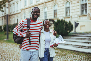 Happy Students Walking Together On College Campus During Daytime