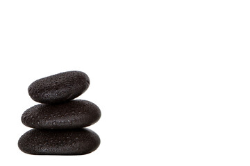 Stack of wet black spa stones