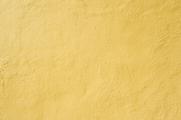 yellow cement grainy texture on the wall