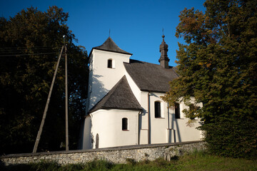 Fototapeta premium Church of Exaltation of Holy Cross (kościół Podwyższenia Krzyża Świętego) in Chrzanów County. Plaza (village in Lesser Poland Voivodeship), Poland.