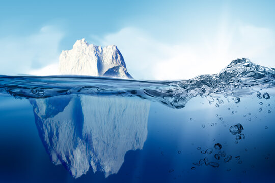 Underwater view of iceberg with beautiful transparent sea on background . Iceberg in clear blue water and hidden danger under water. Iceberg Hidden Danger And Global Warming Concept. Floating ice 
