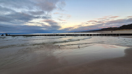 Ustka. Plaża. Falochron.
