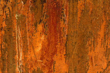 Texture of old rusty metal with scratches and mother-in-law. Abstract grunge metal texture with traces of multi-colored paint