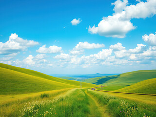 Fototapeta premium Railway track through rolling hills with blue sky and fluffy white clouds, winding paths, open roads, natural beauty, idyllic scenery, scenic countryside