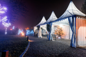 Festive Outdoor Tents with Christmas Decorations © guepardprod