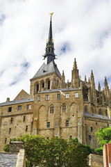 Obraz premium Roofs and abbey in Mont Saint Michel in Normandy, France