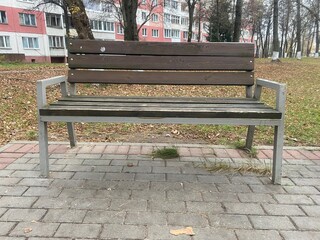 A bench in the park in the fall
