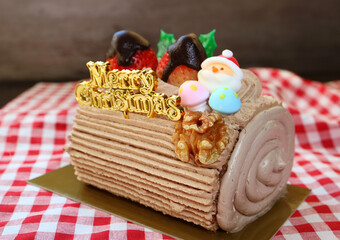 Mouthwatering Christmas Yule Log Cake or Buche de Noel with Greetings