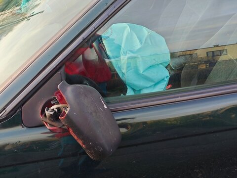 Car crash and airbag worked well. View through closed window