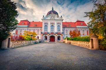 Fototapeta premium Stunning morning view of Royal Palace of Godollo. Beautiful autumn scene of Godollo - city in Pest County, Budapest metropolitan area, Hungary, Europe. Traveling concept background.