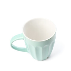 Blue ceramic cup on white background