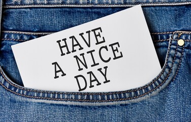 Sticky note in jeans pocket with text note Have a Nice Day, concept of earning or getting more...