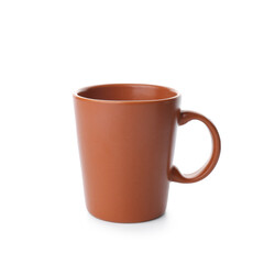 Brown empty ceramic mug on white background