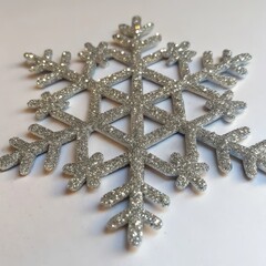 a snowflake that has a white background