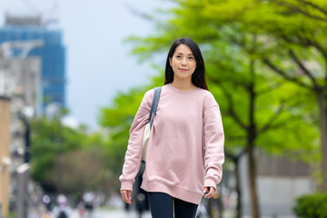 Woman exploring city streets in Taipei Taiwan