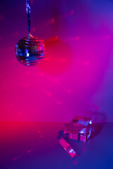 Glass prisms and a ball in colored light