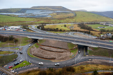 Aerial view of construction of a new dual carriageway road in the South Wales valleys (UK)