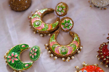 Indian Handcrafted jewellery and bangles displayed in local shop in a market of Pune, India, silver oxidised jewellery, Gold, Silver as beauty accessories by Indian women.