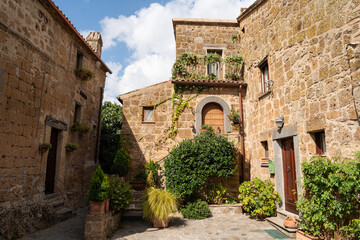 Charming rustic courtyard surrounded by stone architecture