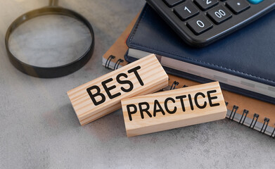 Best practice words in wooden blocks. Business or healthcare concept.