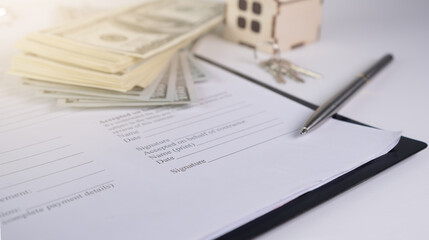Real estate rental signing an agreement, the pen was lying on the rental agreement.