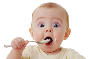 Surprised baby eating food from a spoon, isolated on transparent cutout background
